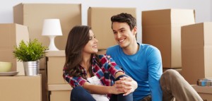 happy-couple-moving-into-new-house